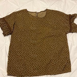 Polka dot dress shirt.